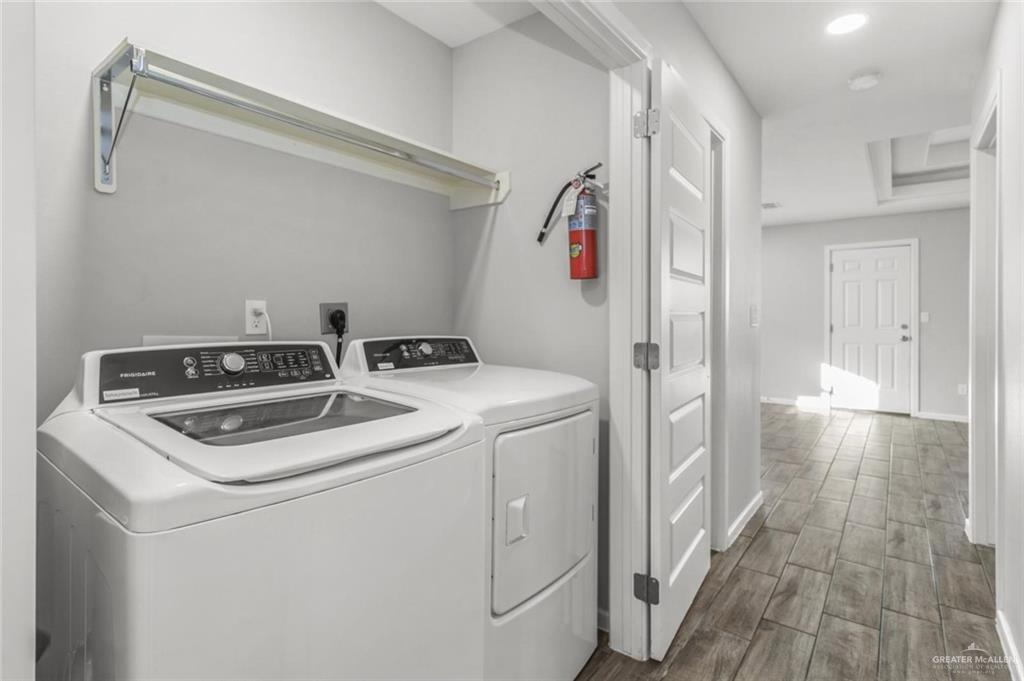 2011 Stardust Lane, Unit 4 Edinburg, TX 78541 - Photo 9 of 10 a utility room with dryer and washer