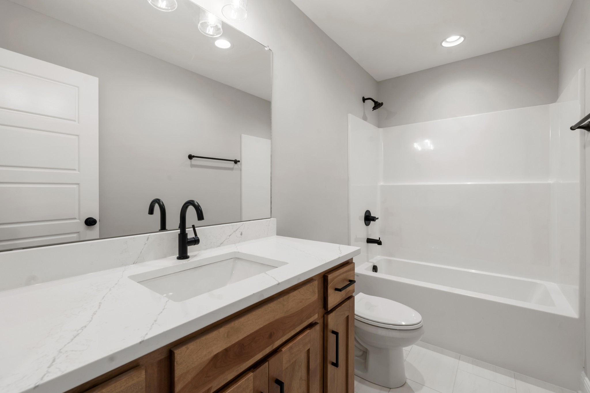 8184 Gideon Road Greenbrier, TN 37073 - Photo 15 of 25 a bathroom with a sink a toilet and shower