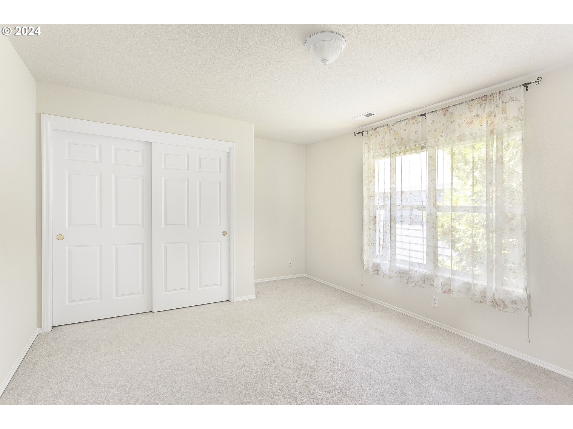 249 Southeast 46th Drive Gresham, OR 97080 - Photo 17 of 22 a view of an empty room with a window