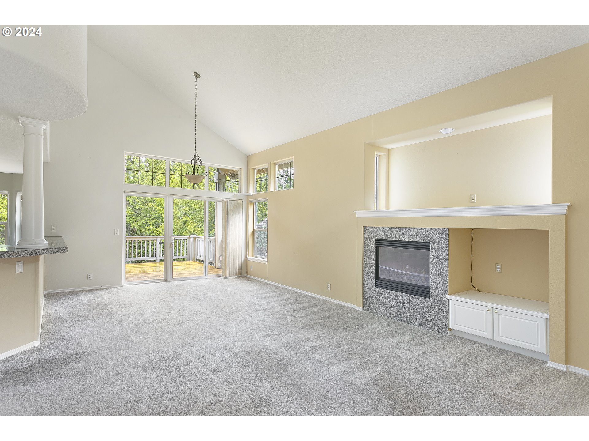 249 Southeast 46th Drive Gresham, OR 97080 - Photo 4 of 22 a view of an empty room with a window