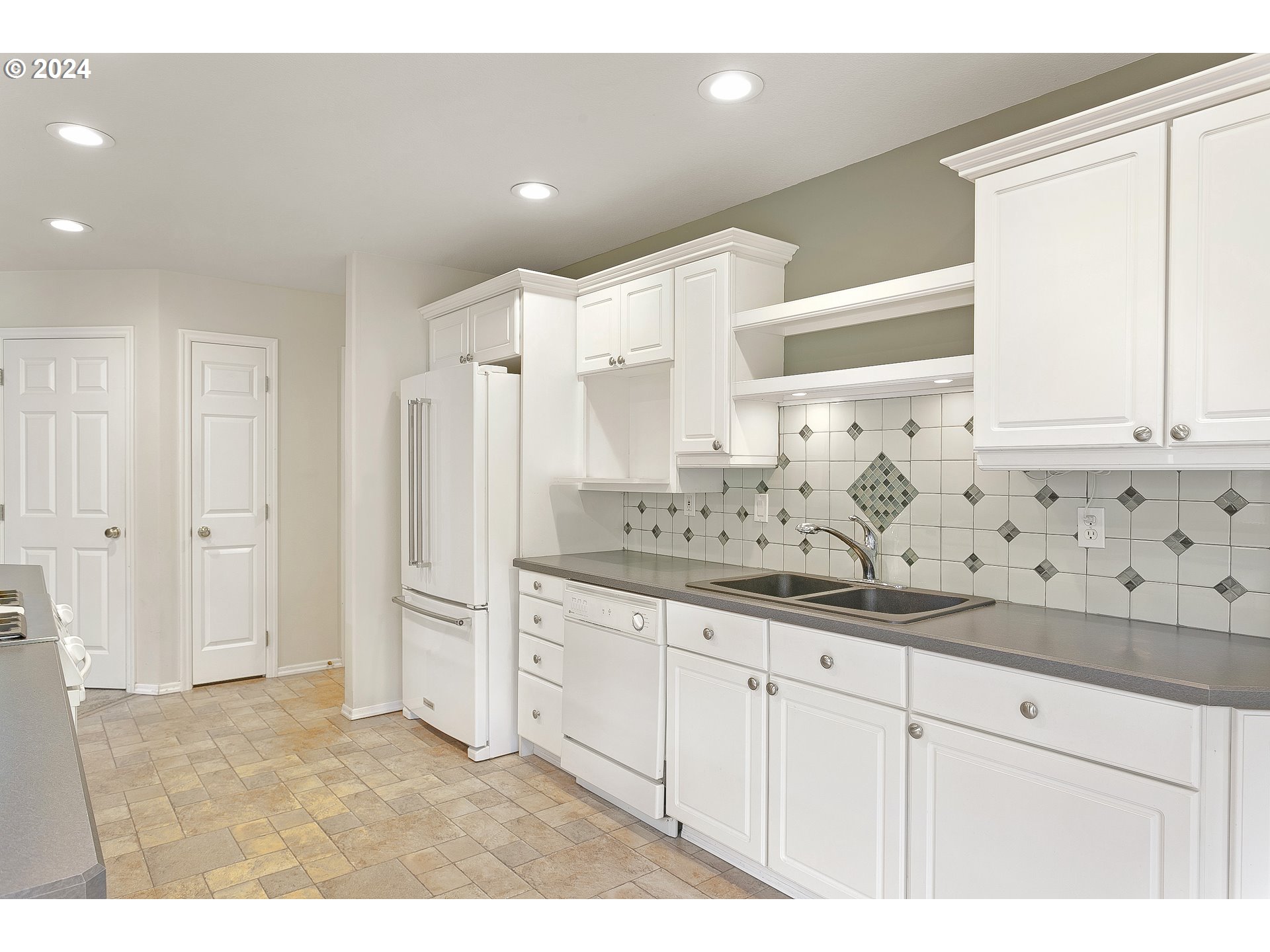 249 Southeast 46th Drive Gresham, OR 97080 - Photo 5 of 22 a bathroom with a granite countertop sink and a mirror