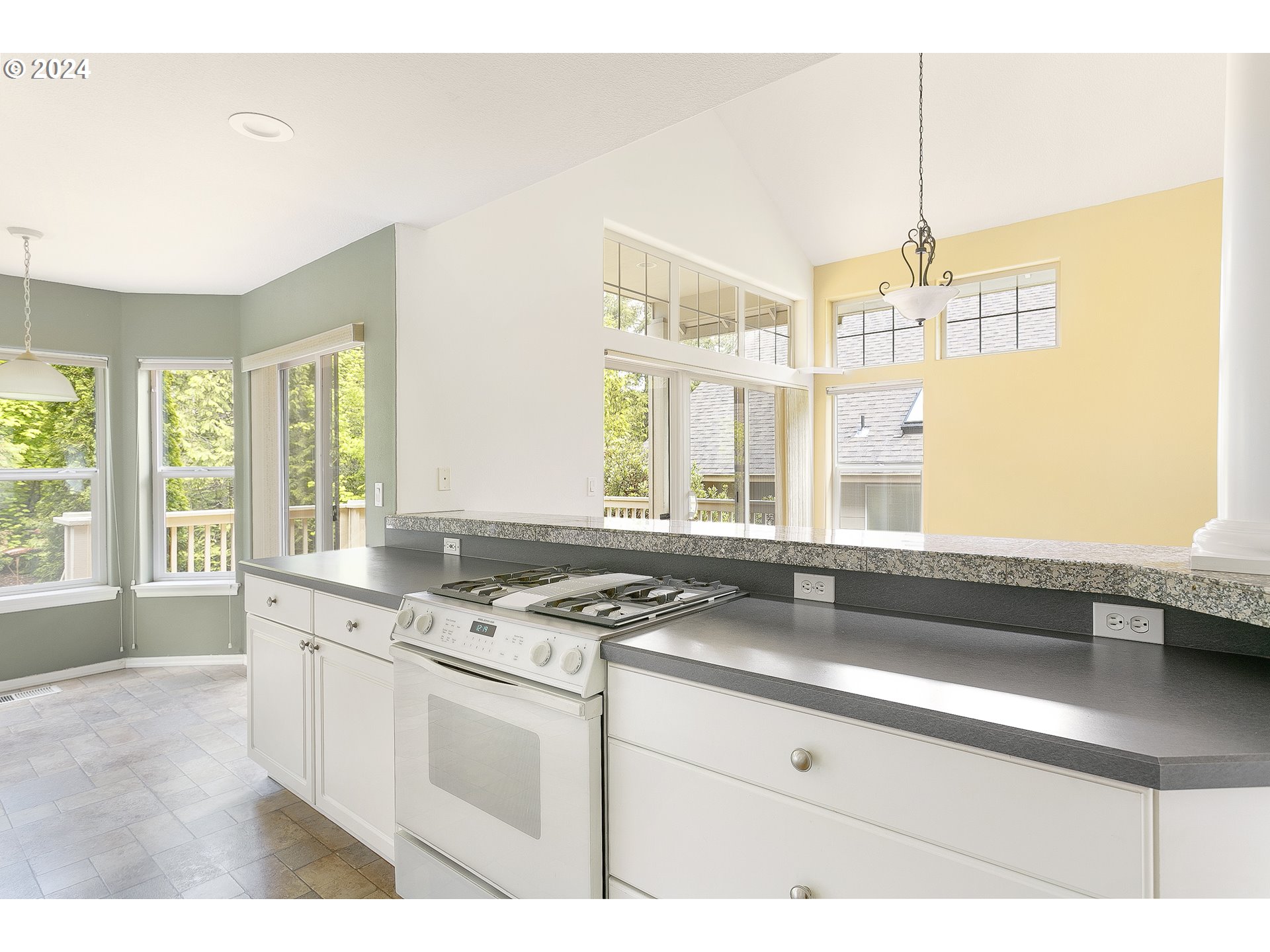 249 Southeast 46th Drive Gresham, OR 97080 - Photo 6 of 22 a kitchen with a sink stove and window