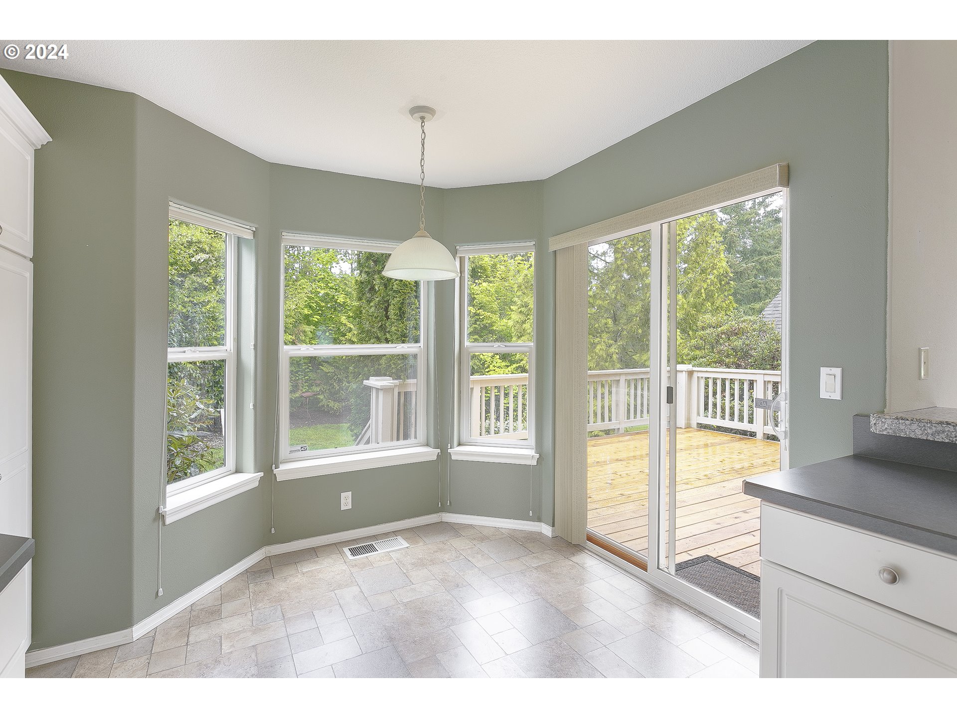 249 Southeast 46th Drive Gresham, OR 97080 - Photo 8 of 22 a view of an empty room with a window