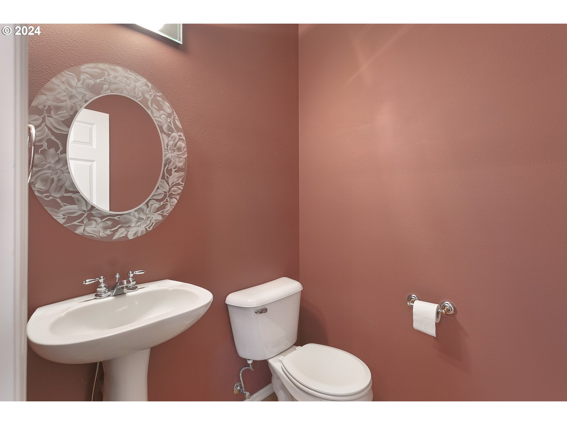 249 Southeast 46th Drive Gresham, OR 97080 - Photo 10 of 22 a bathroom with a toilet sink and mirror