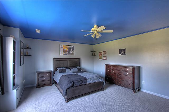 975 Rip Steele Road Columbia, TN 38401 - Photo 12 of 20 The upstairs has two bedrooms, a full bath, a bonus room, and a walk-out storage area. The bedrooms contain walk-in closets.