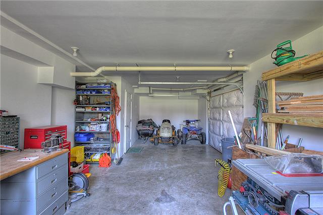 975 Rip Steele Road Columbia, TN 38401 - Photo 15 of 20 The property contains a full basement with a 14X28 workshop. Notice the insulated garage door for easy access outdoors.