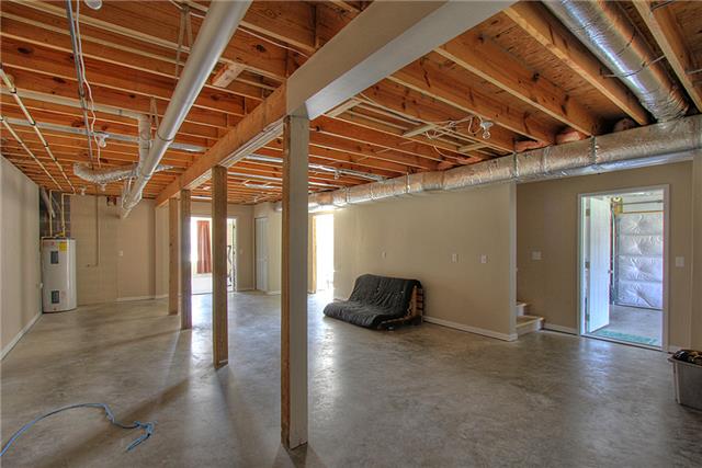 975 Rip Steele Road Columbia, TN 38401 - Photo 16 of 20 There is an amazing 1329 sq. ft. (m/l) unfinished space in the basement including the workshop area.