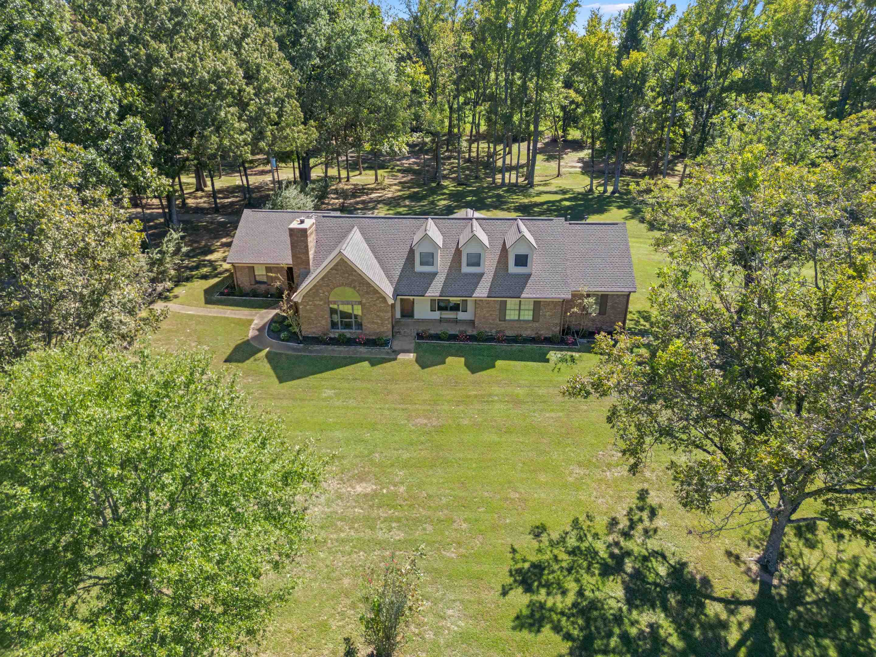 650 Blain Road Rossville, TN 38066 - Photo 31 of 32 Enjoy the beauty of this sprawling 13-acre property surrounded by mature trees, open green space, and endless possibilities for country living.
