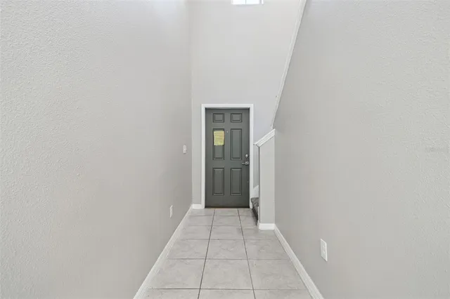 a kitchen with granite countertop a cabinets and steel stainless steel appliances