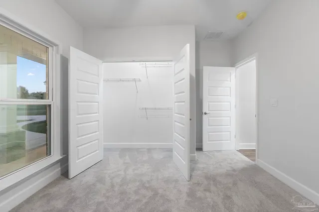 an empty room with closet
