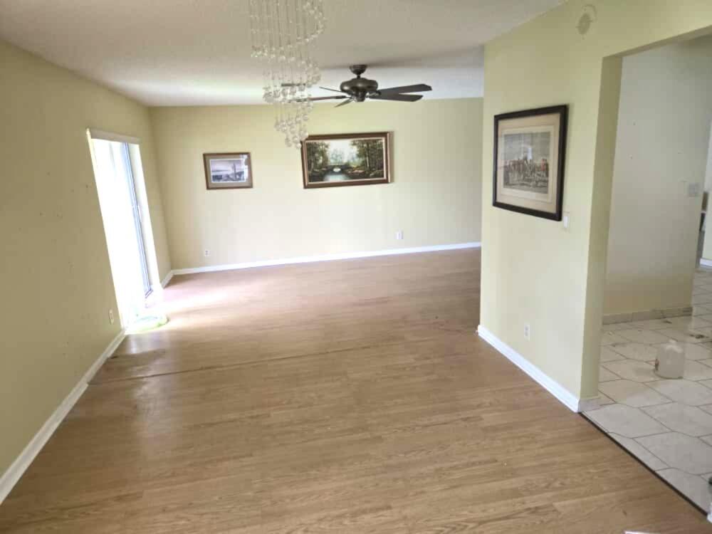 6045 Stanley Lane Delray Beach, FL 33484 - Photo 2 of 4 a view of an empty room with a window