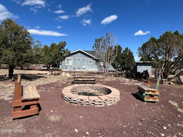 a view of a covered with snow in the background