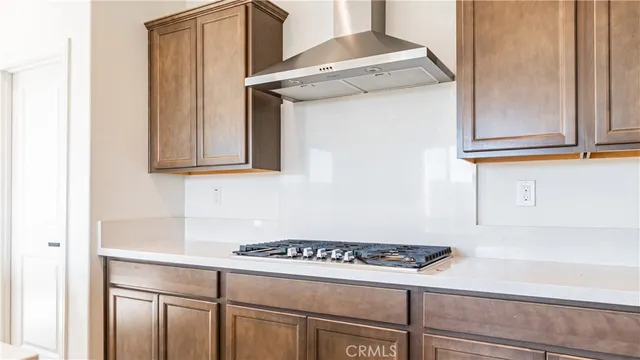 a kitchen with a stove and a microwave