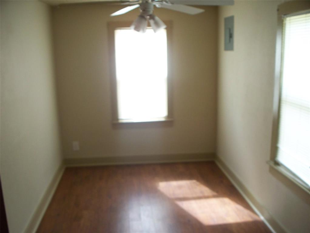 705 South Street, Unit A Graham, TX 76450 - Photo 7 of 7 an empty room with a window