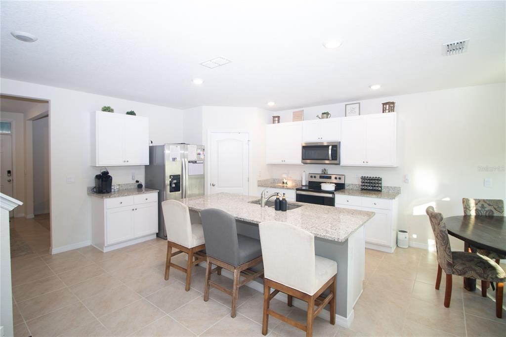 3033 Beau Loop Tavares, FL 32778 - Photo 5 of 36