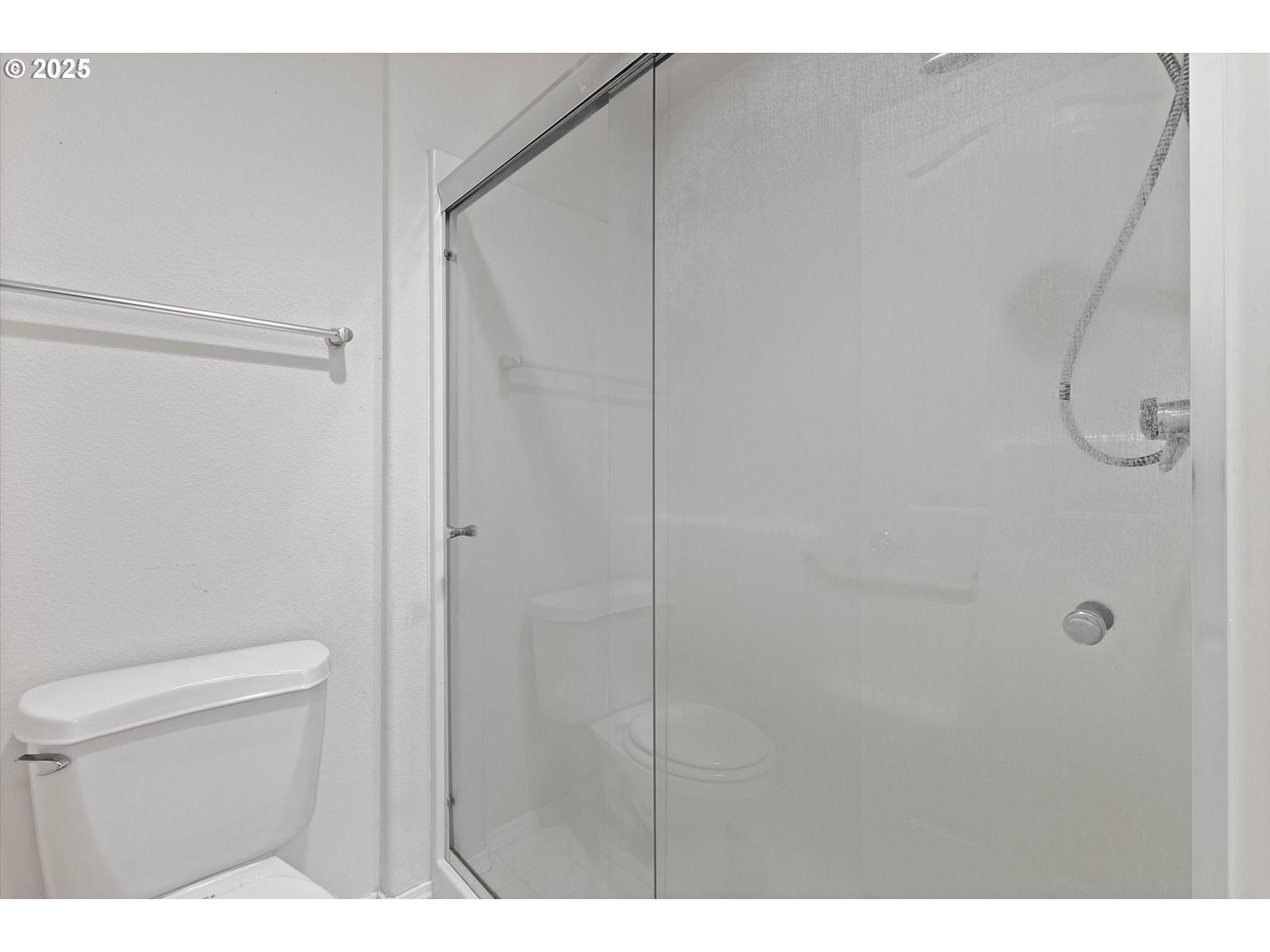 2708 North Main Street Newberg, OR 97132 - Photo 22 of 29 a bathroom with a shower and a toilet