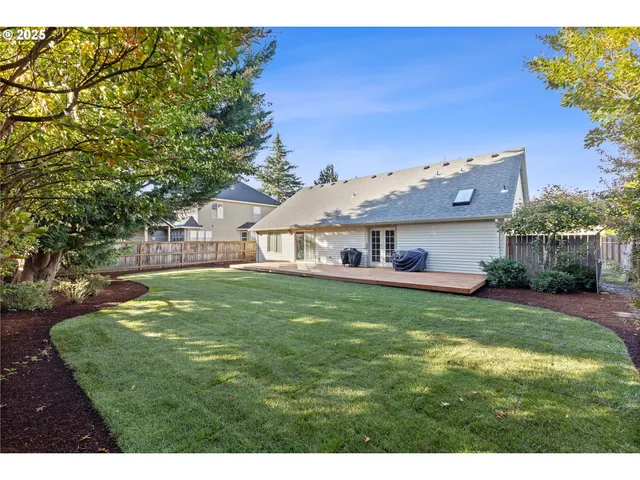 a view of a house with a big yard