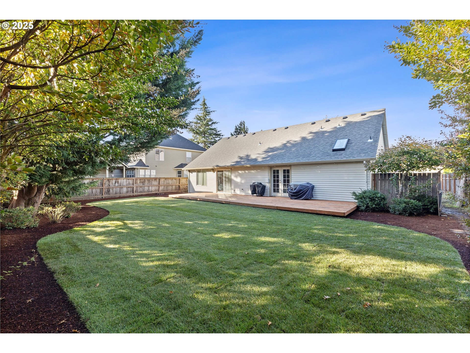 2708 North Main Street Newberg, OR 97132 - Photo 5 of 29 a view of a house with a big yard