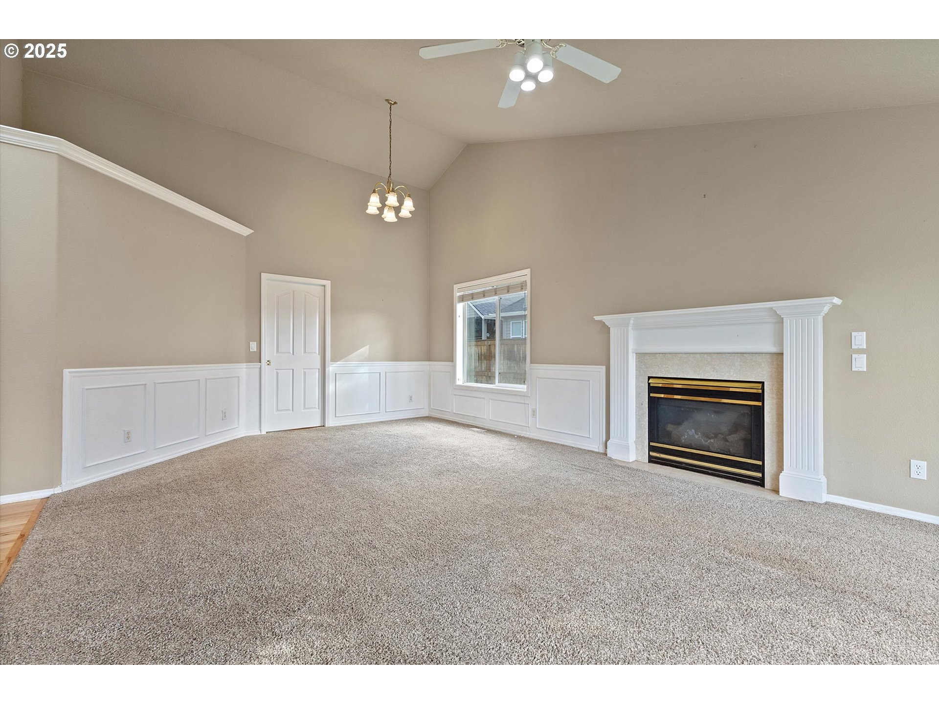 2708 North Main Street Newberg, OR 97132 - Photo 10 of 29 a view of empty room with a fireplace