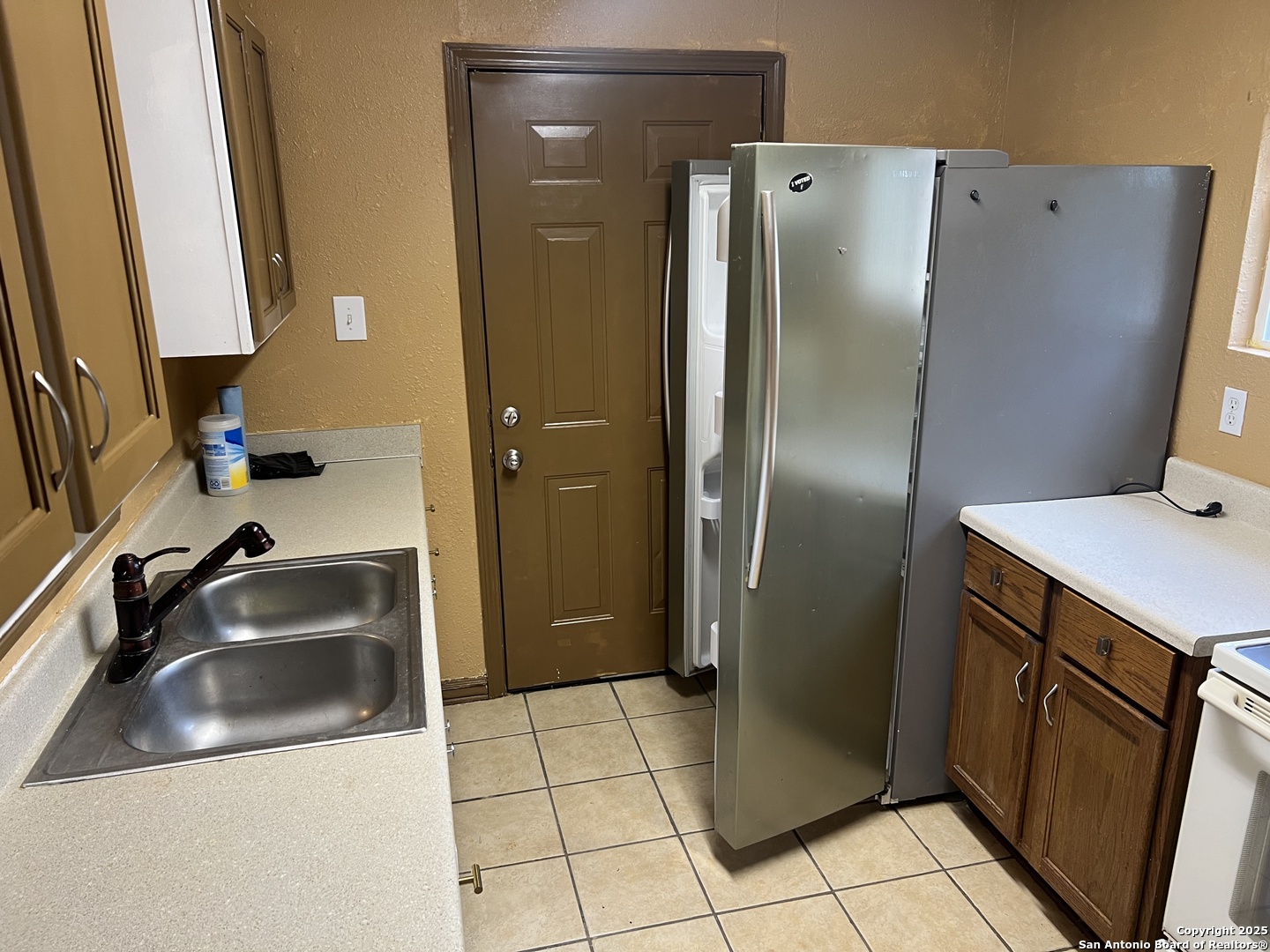 111 Rene Avenue San Antonio, TX 78233 - Photo 7 of 15 a bathroom with a sink and mirror