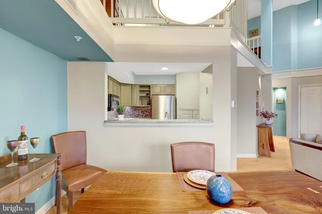 a bathroom with a toilet sink a mirror and bathtub