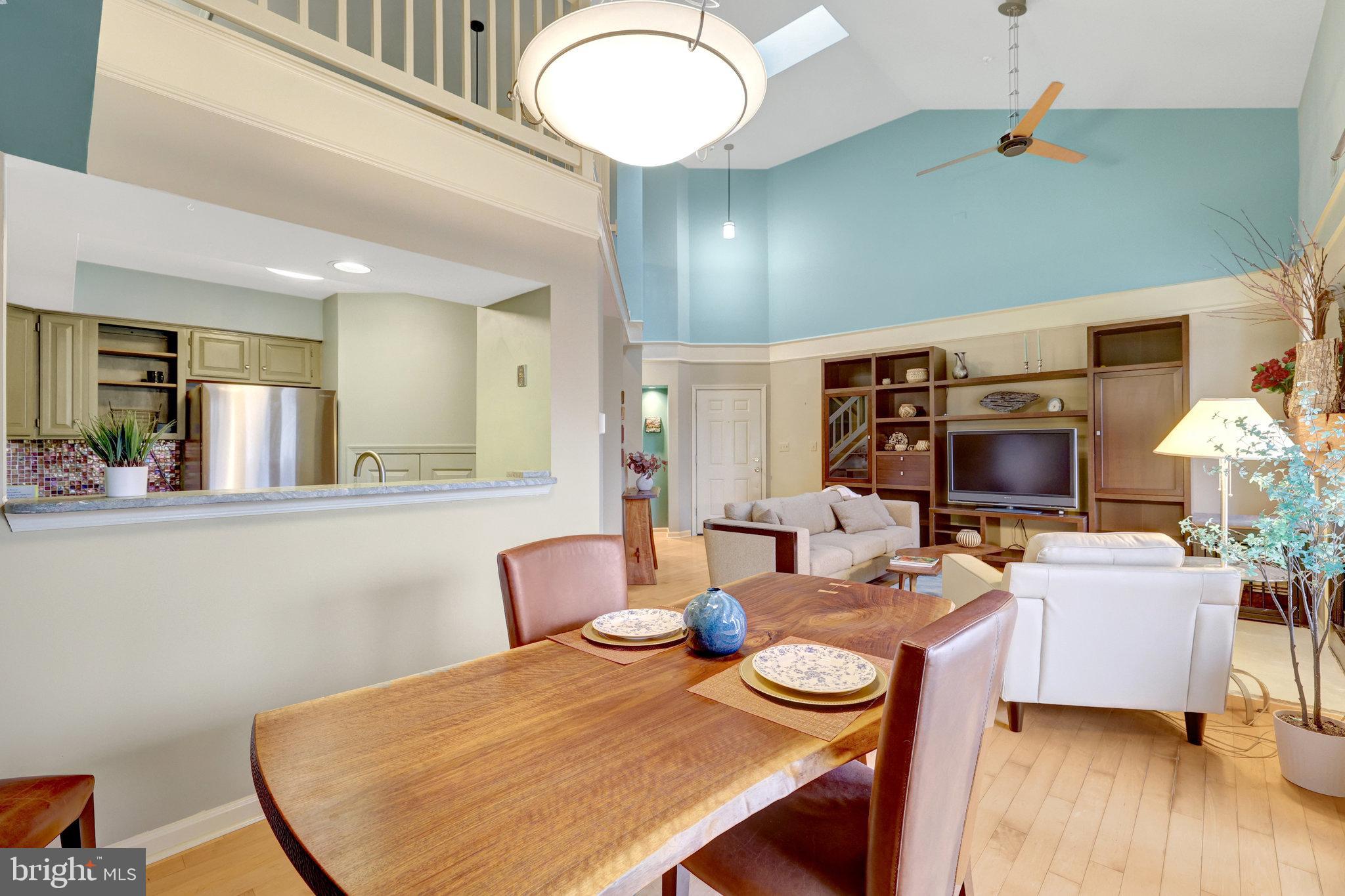 1334 Garden Wall Circle, Unit E Reston, VA 20194 - Photo 15 of 51 Bright and airy open-concept living space.