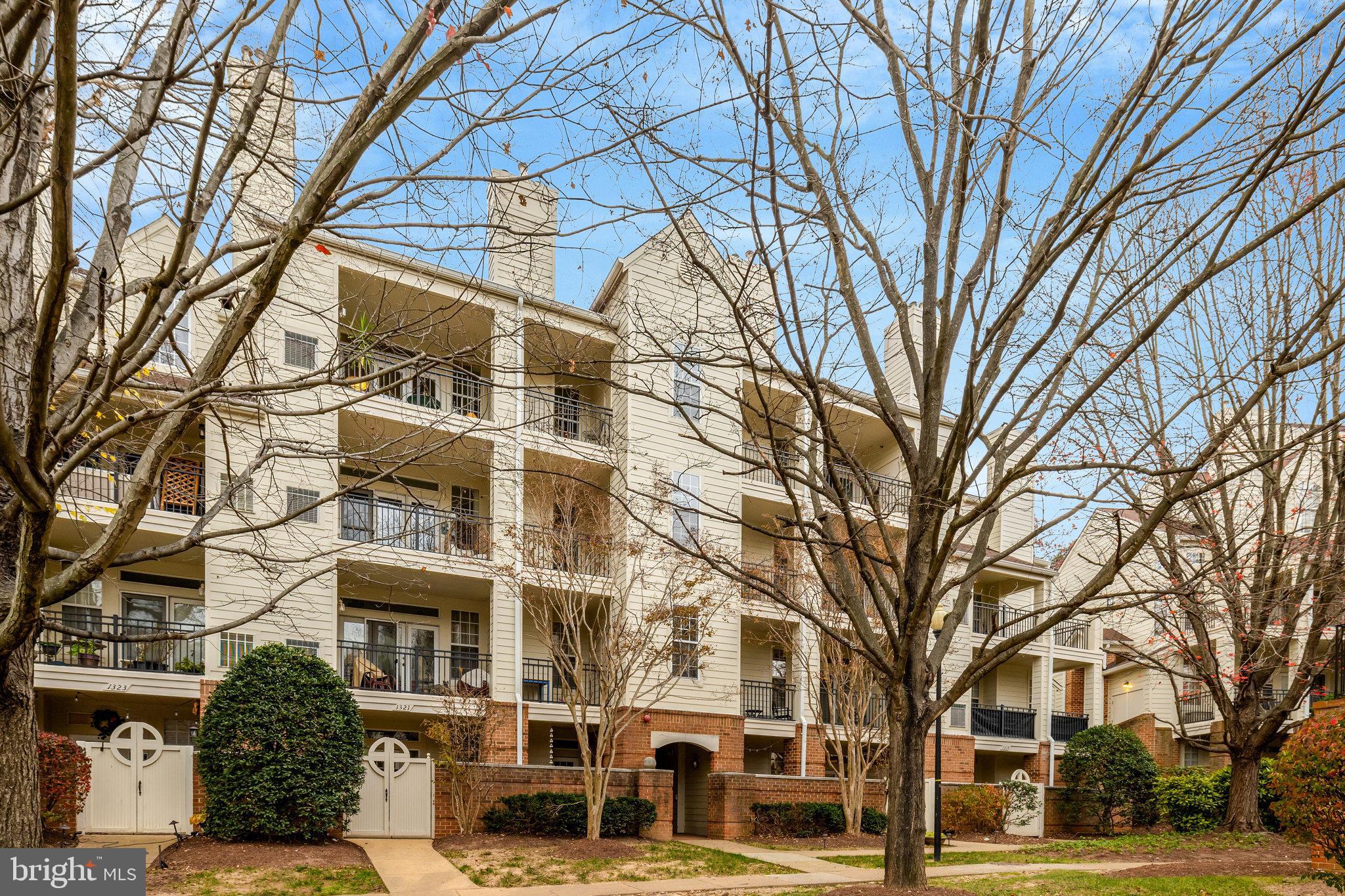 1334 Garden Wall Circle, Unit E Reston, VA 20194 - Photo 16 of 23 a view of a building with a snow in front of building