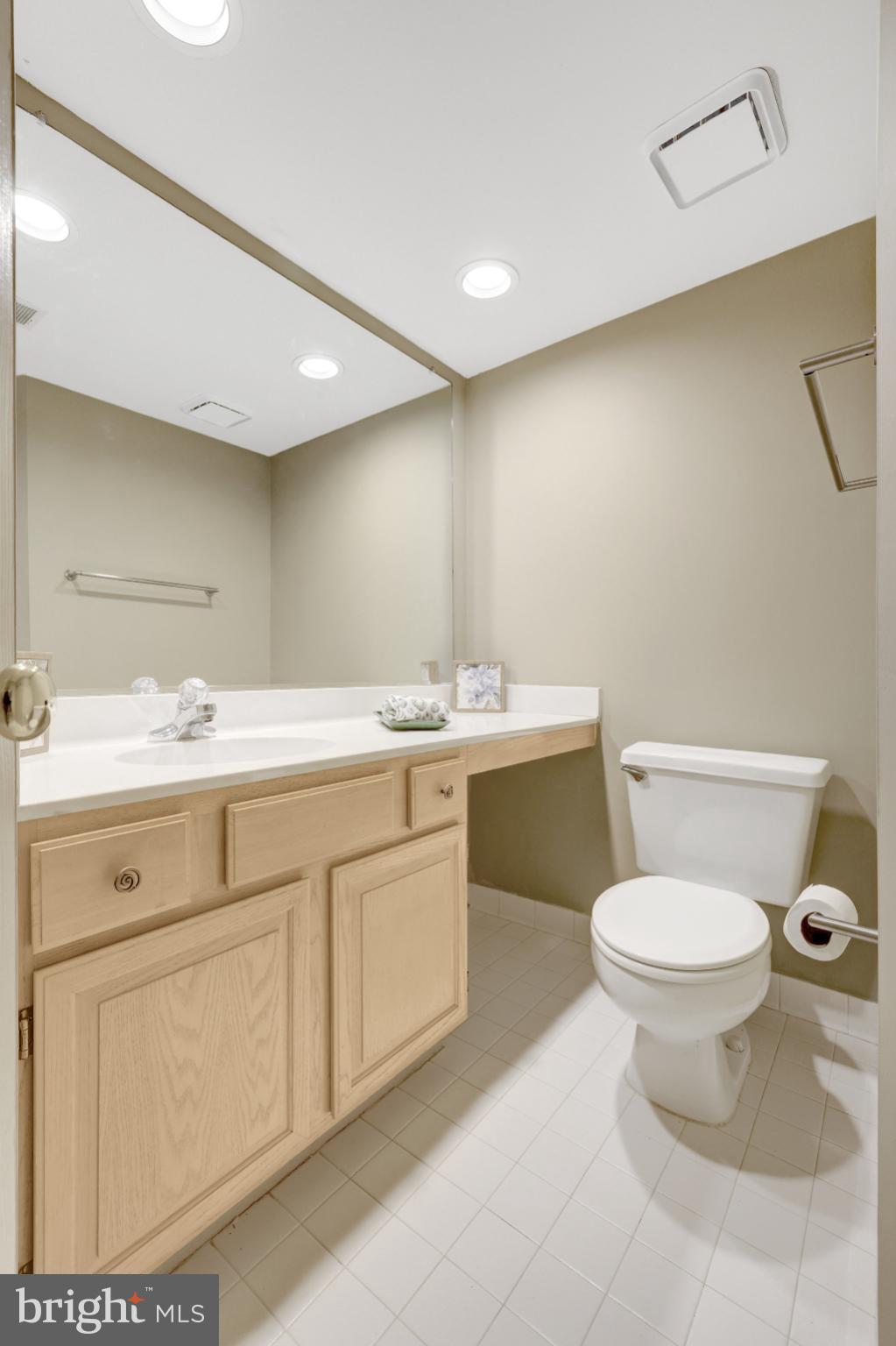 1334 Garden Wall Circle, Unit E Reston, VA 20194 - Photo 22 of 51 Convenient powder room near the living room