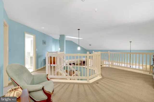 a view of kitchen with furniture and window