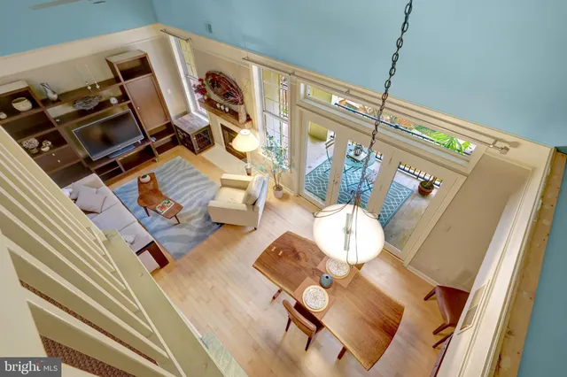 a view of living room with furniture and rug