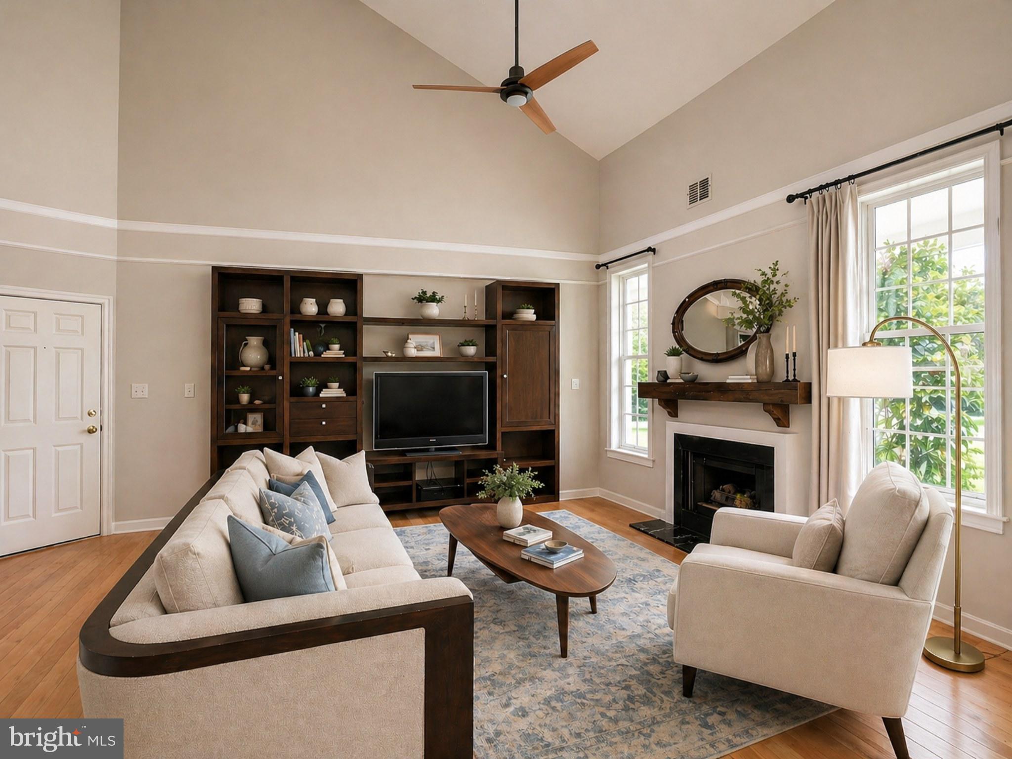 1334 Garden Wall Circle, Unit E Reston, VA 20194 - Photo 3 of 23 a living room with furniture and a fireplace