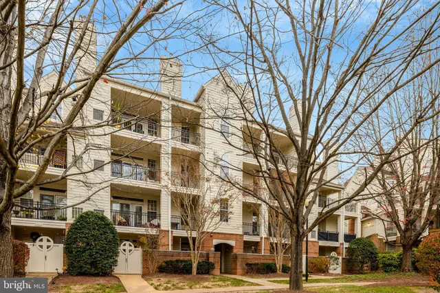 a view of a building with a snow in front of building