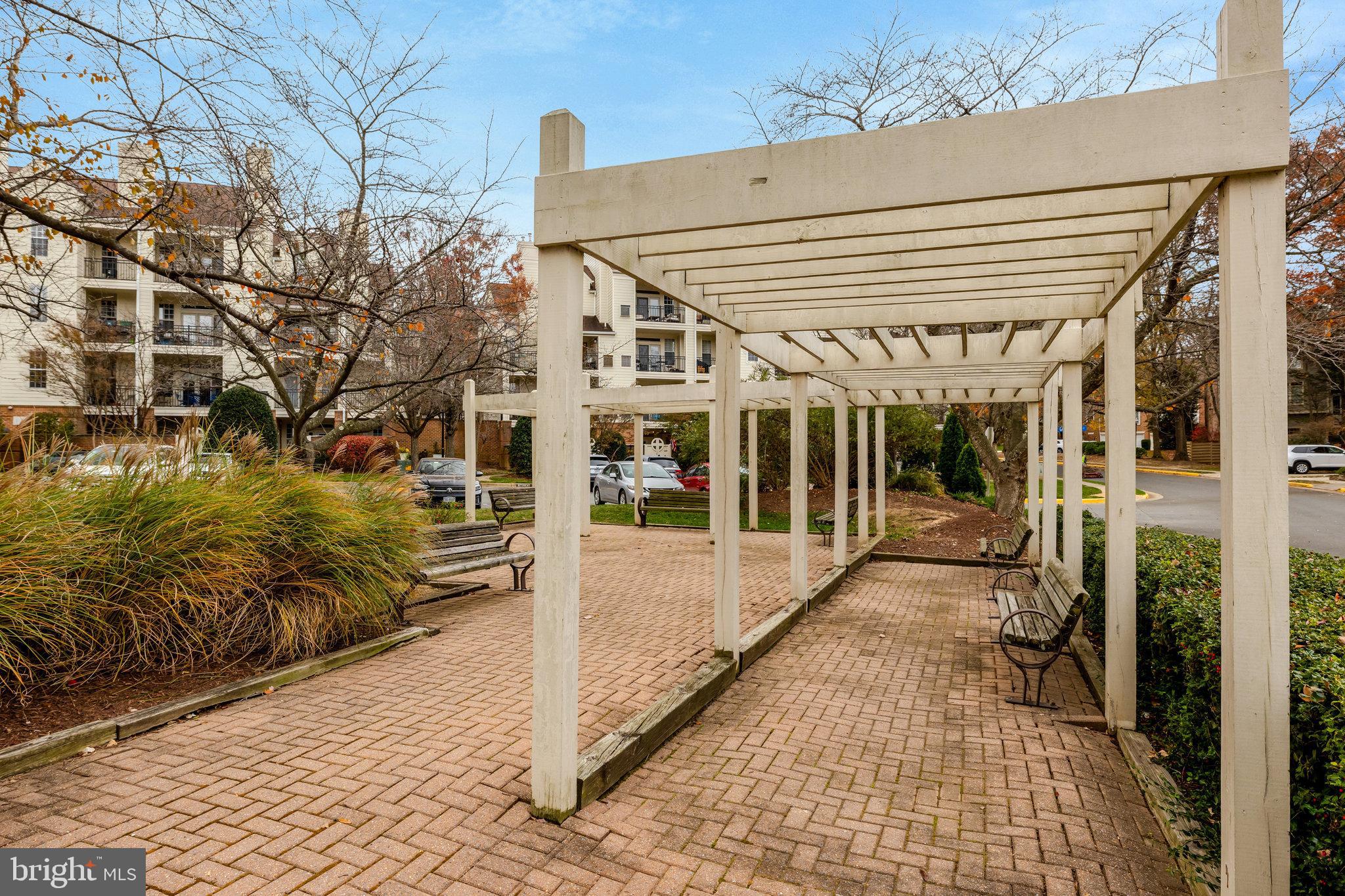 1334 Garden Wall Circle, Unit E Reston, VA 20194 - Photo 40 of 51 Charming walkway with serene landscaping.