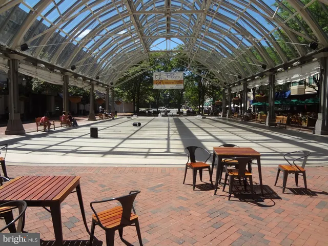 a view of a chairs and table in a patio
