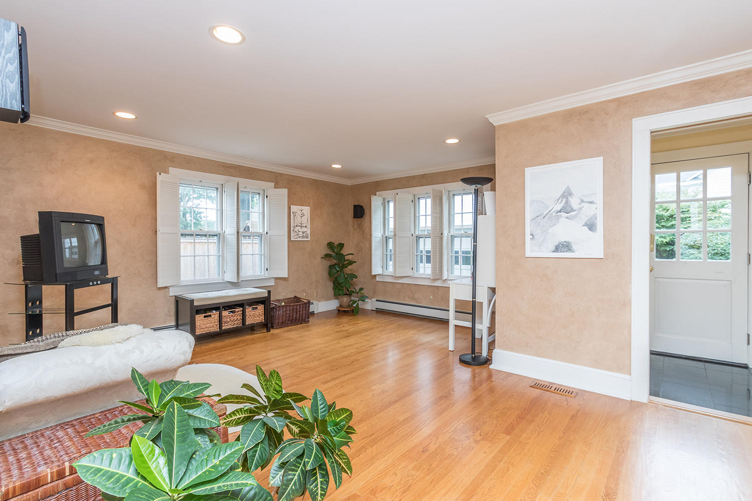 8 Abbey Road Darien, CT 06820 - Photo 15 of 39 a living room with furniture and a table with wooden floor