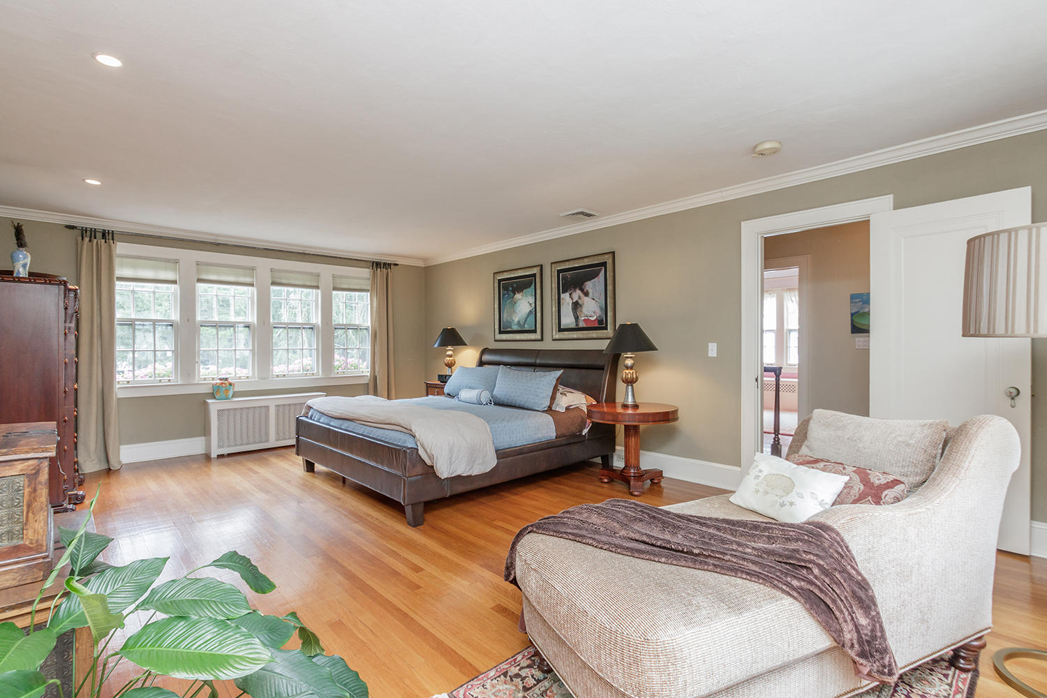 8 Abbey Road Darien, CT 06820 - Photo 19 of 39 a bedroom with furniture and a large window