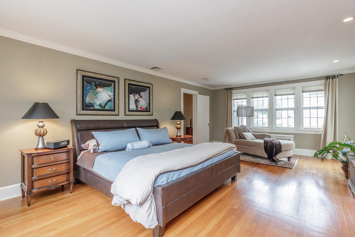 8 Abbey Road Darien, CT 06820 - Photo 22 of 39 a bedroom with a bed and wooden floor