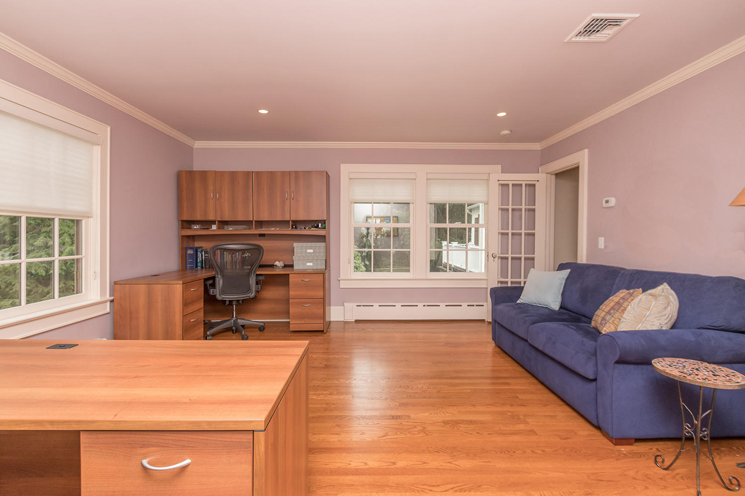 8 Abbey Road Darien, CT 06820 - Photo 28 of 39 a living room with furniture and a fireplace