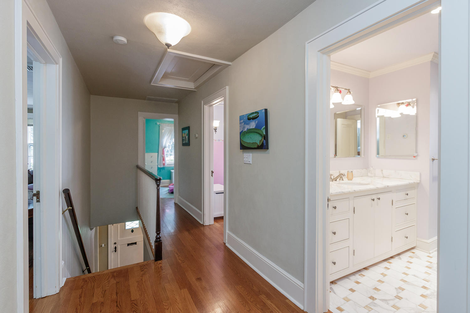 8 Abbey Road Darien, CT 06820 - Photo 31 of 39 a view of hallway with mirror and wooden floor