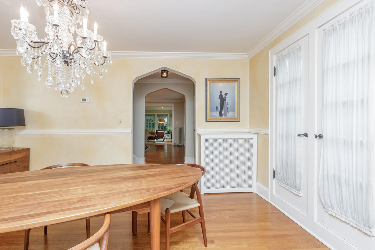 8 Abbey Road Darien, CT 06820 - Photo 10 of 39 a view of a dining room with furniture and chandelier
