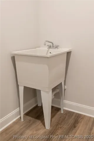 a view of entryway with wooden floor