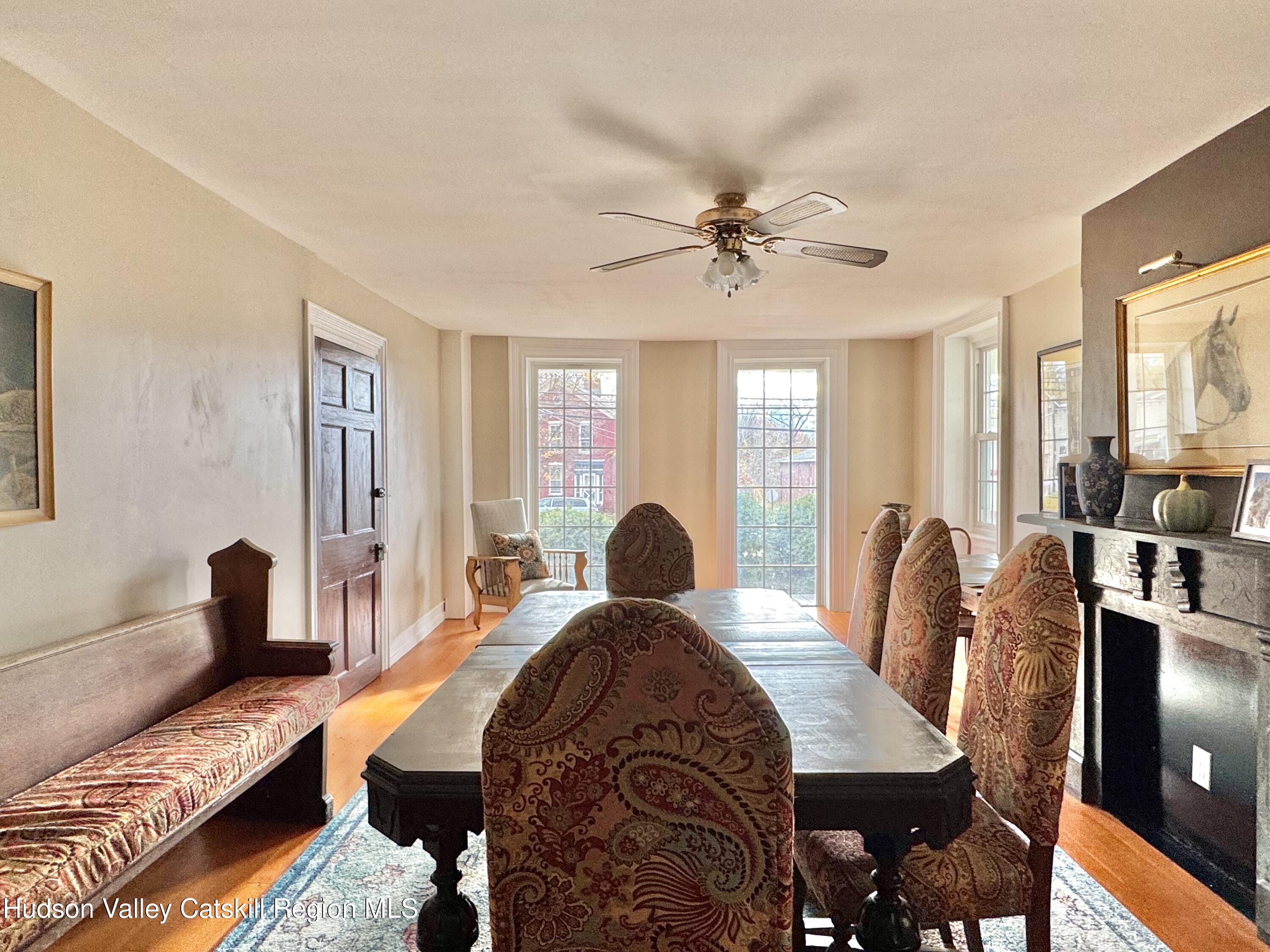 1114 Main Street Catskill, NY 12451 - Photo 14 of 40 a view of a a dining room with furniture window and wooden floor