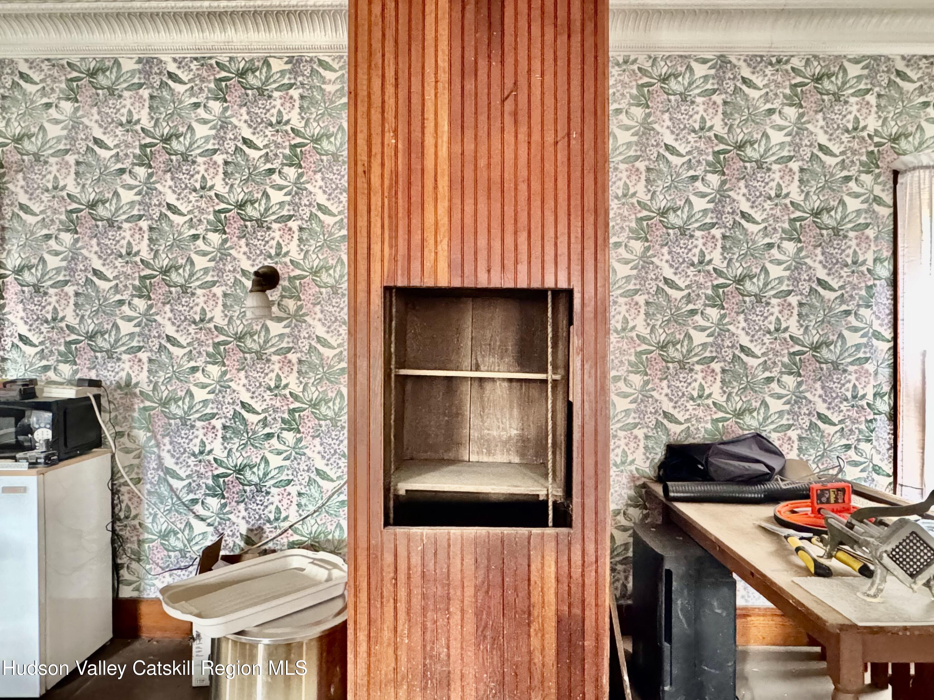 1114 Main Street Catskill, NY 12451 - Photo 29 of 40 a kitchen with a stove and a refrigerator