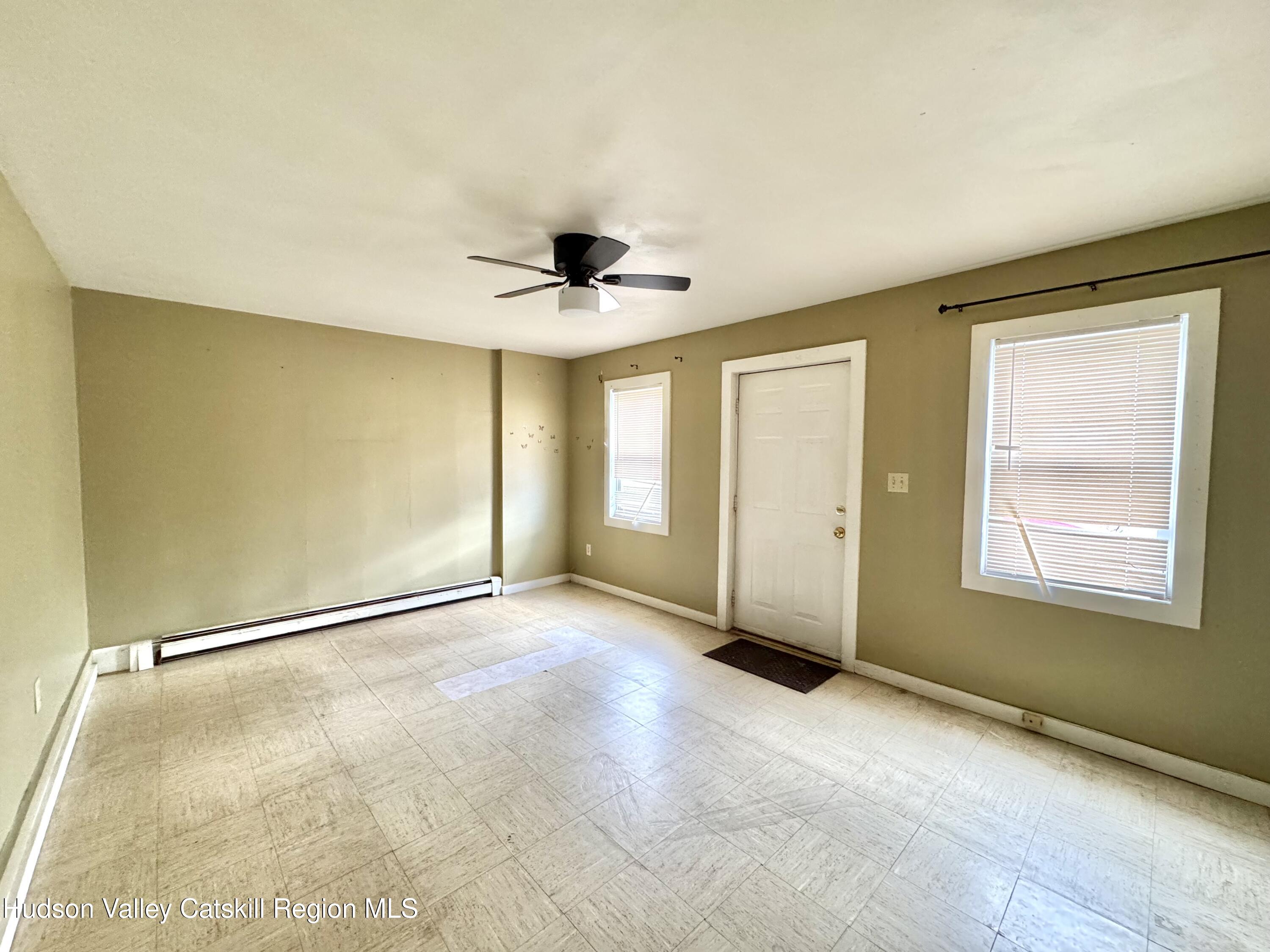 1114 Main Street Catskill, NY 12451 - Photo 33 of 40 a view of an empty room with a window