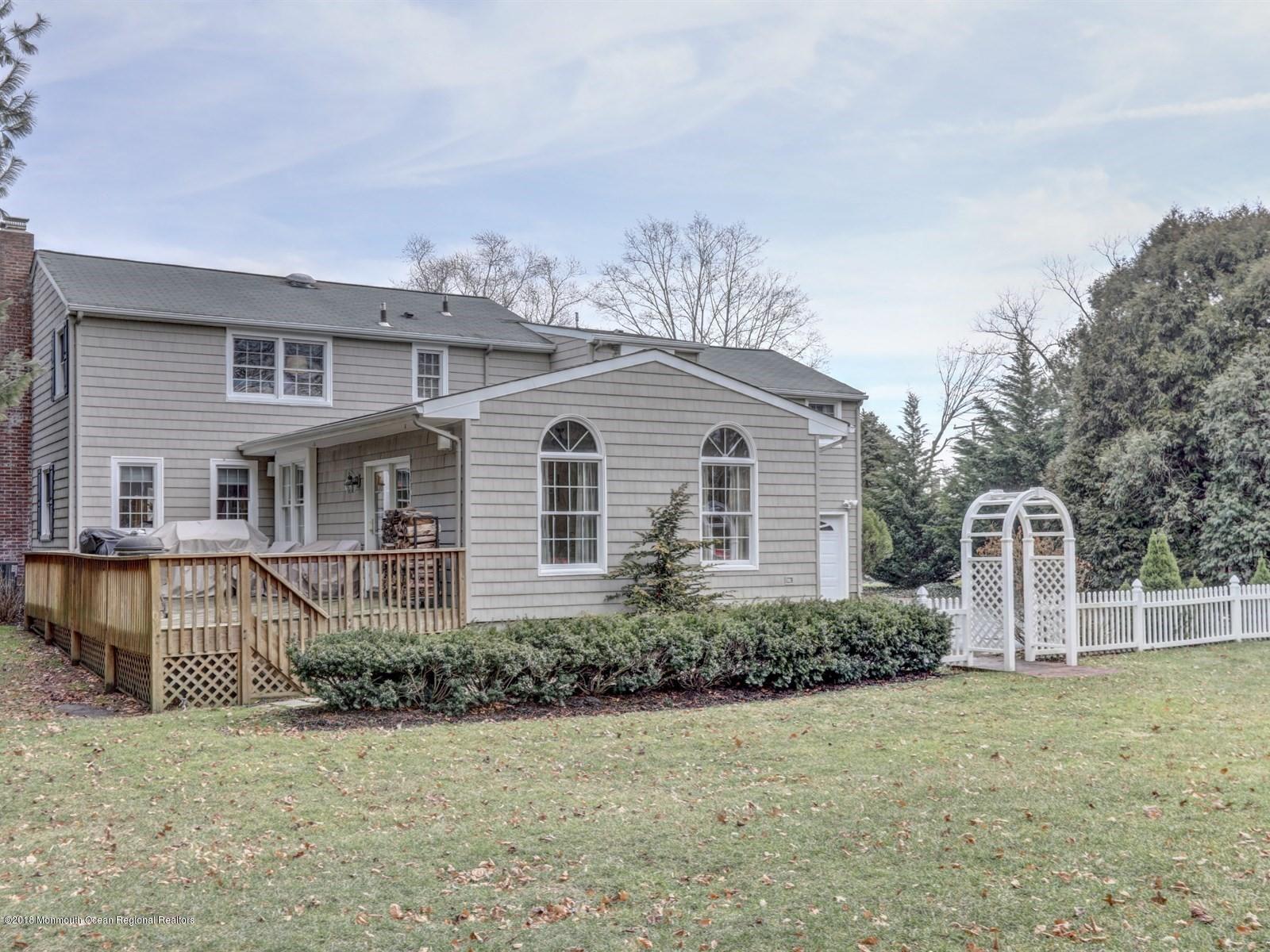 16 Rivers Edge Drive Little Silver, NJ 07739 - Photo 31 of 33 a view of a house with backyard and garden