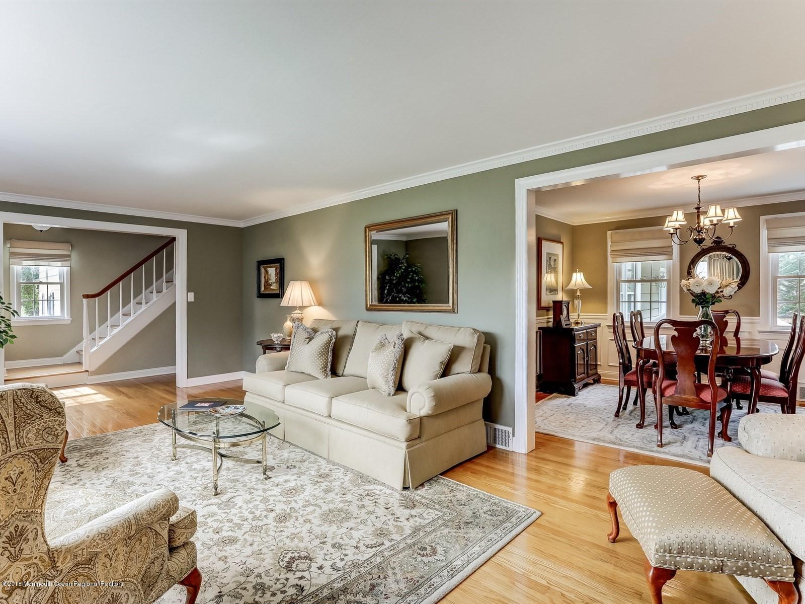 16 Rivers Edge Drive Little Silver, NJ 07739 - Photo 5 of 33 a living room with furniture dining area and a table