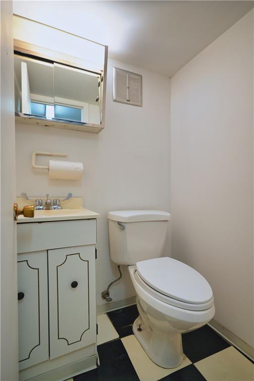 6436 Nicholson Street Pittsburgh, PA 15217 - Photo 47 of 50 half bathroom basement level, convenient when entering through garage or doing laundry