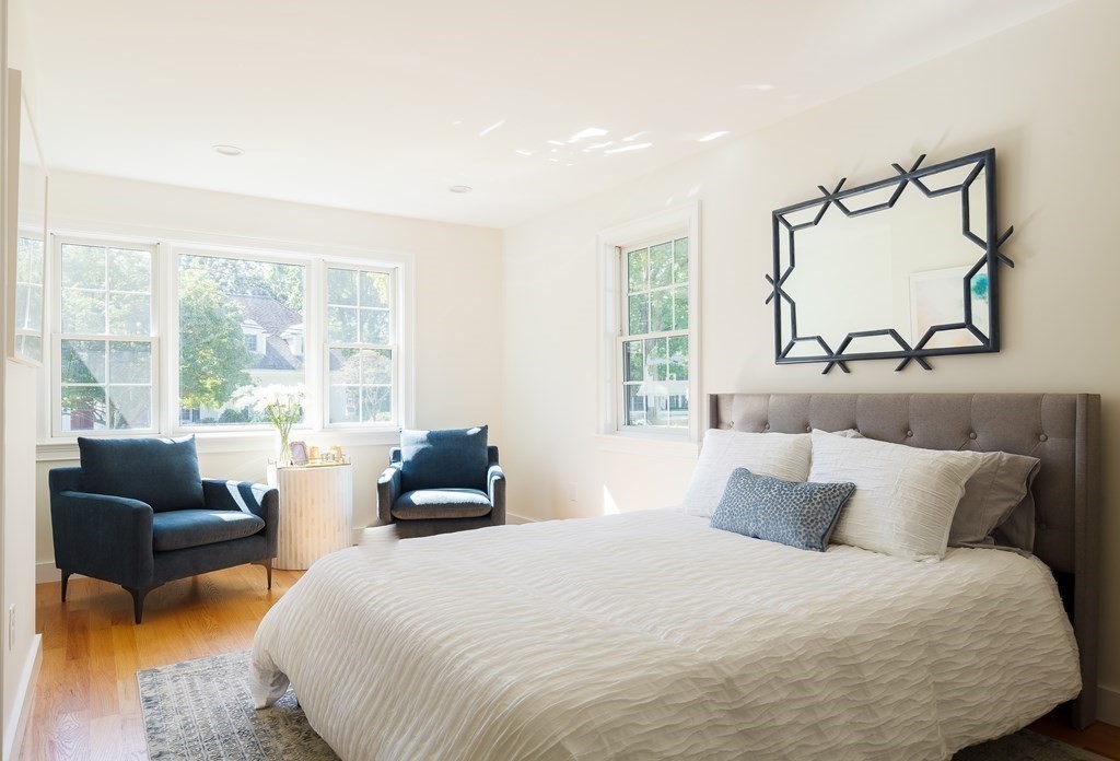 3 Garrison Road Wellesley, MA 02482 - Photo 13 of 36 a bedroom with bed and large window