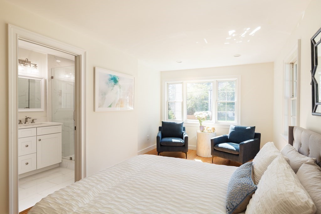 3 Garrison Road Wellesley, MA 02482 - Photo 14 of 36 a bedroom with furniture and large windows