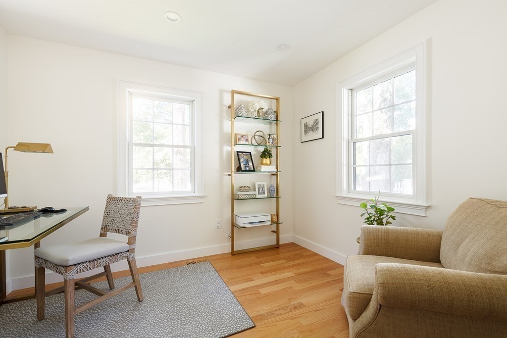 3 Garrison Road Wellesley, MA 02482 - Photo 16 of 36 a living room with furniture and a window